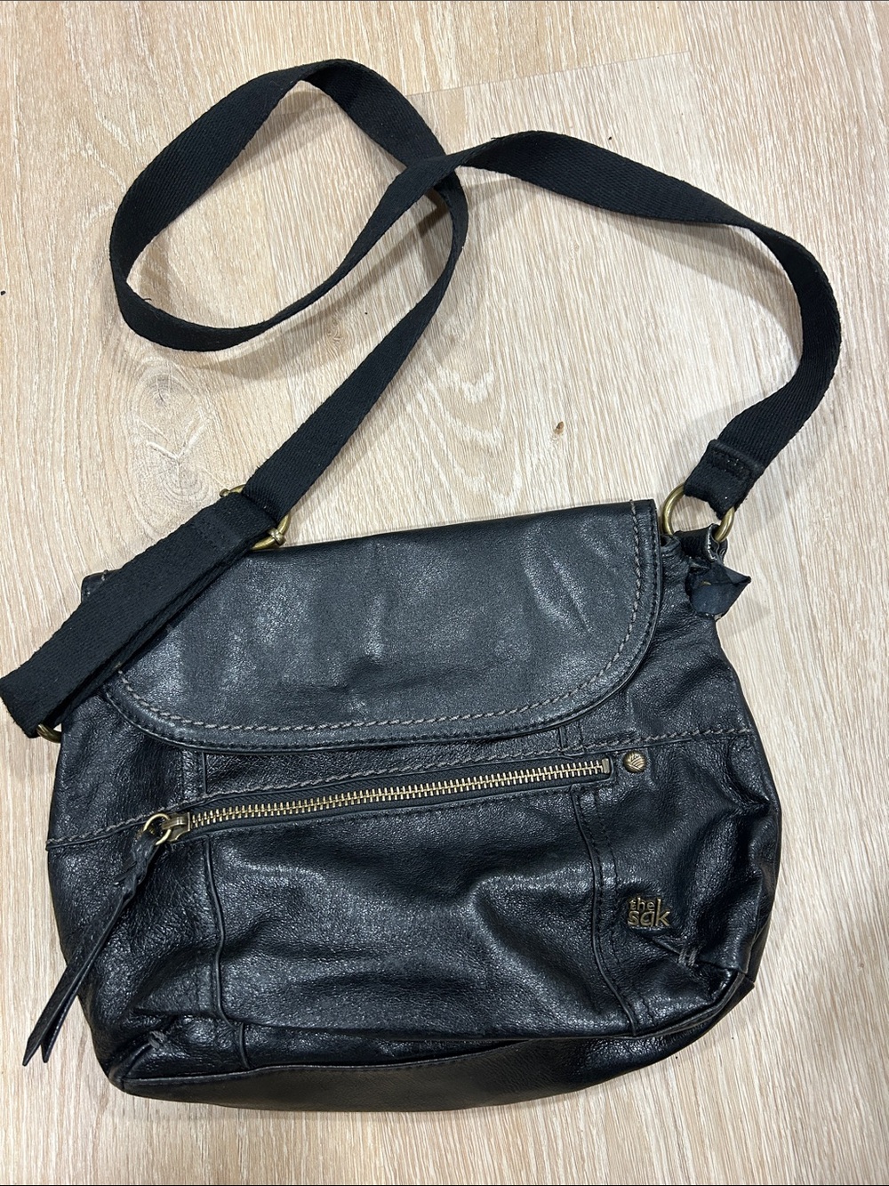 The Sak Black Leather Flap Crossbody with Front Zip Pocket